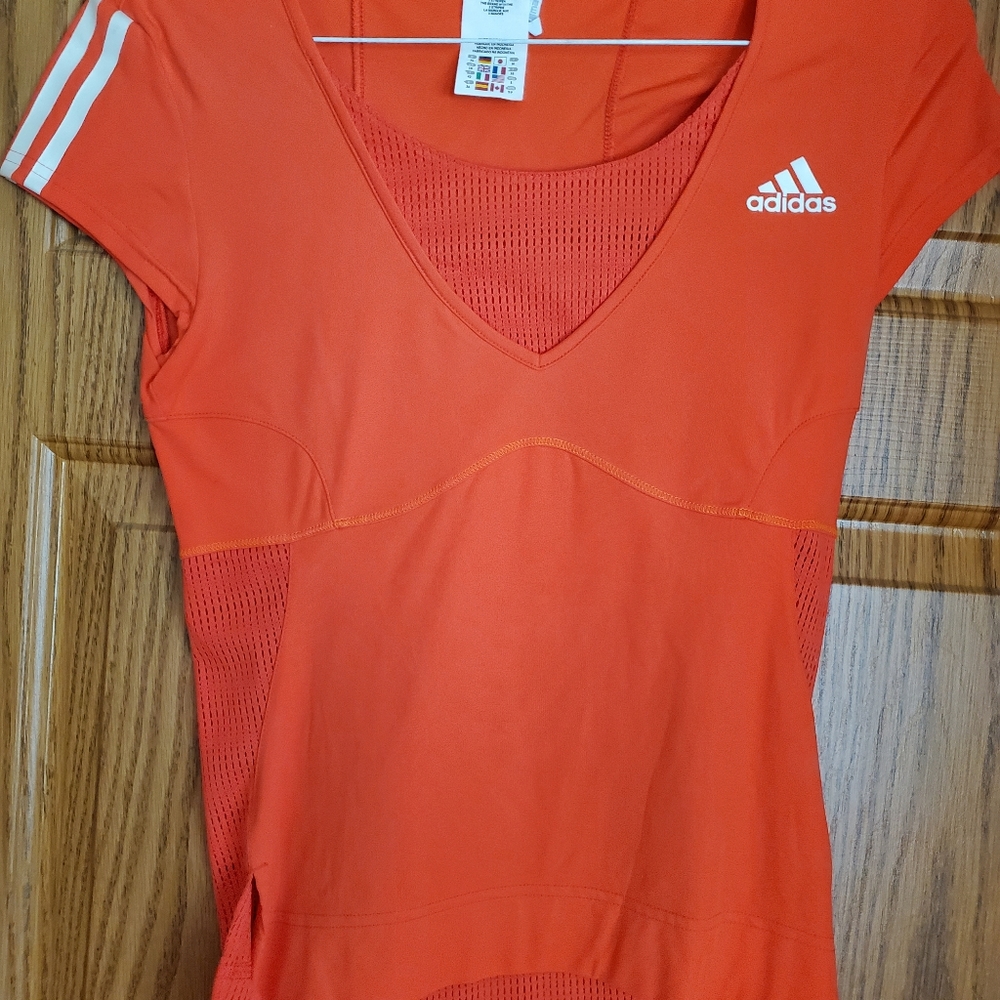 Adidas top for sports wear.
